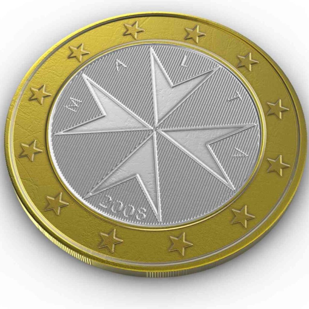  moneta da un euro con la croce sopra 