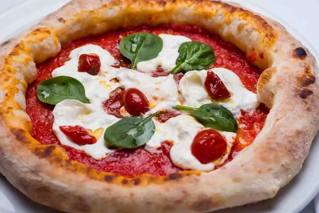 Mal di pancia dopo la pizza: attenzione, ecco il motivo